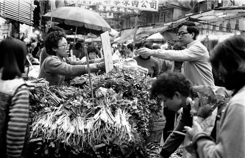 People buying vegetables for their families to celebrate “Lap Chun” - the beginning of spring in the Lunar calendar.
